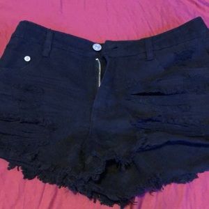 Ripped black shorts